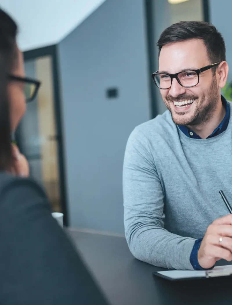 Two professionals talking during a job interview