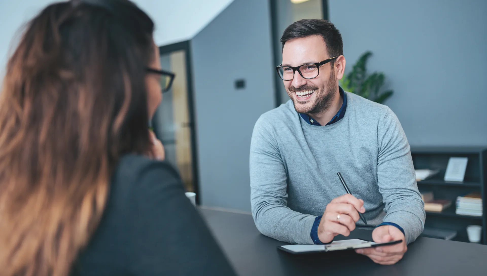 Two professionals talking during a job interview